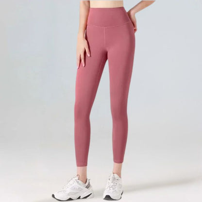 femme porte legging rose