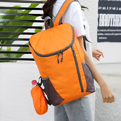 femme porte sac à dos sport orange